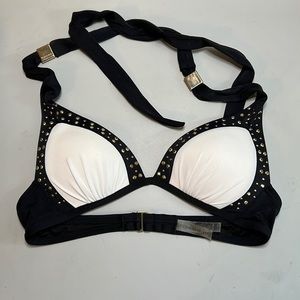 Victoria’s Secret cream with black trim and gold color gems bikini top. Size XS